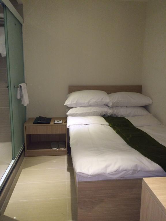 Aparthotel Mini.18 Kowloon Stadt Zimmer foto